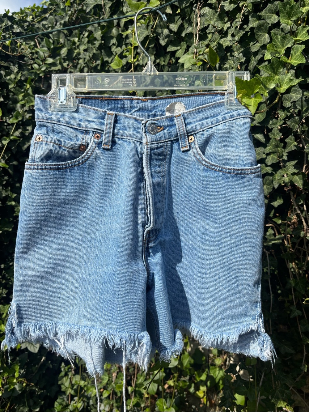 Vintage Levi’s Women’s Light Blue Denim Frayed Hem Cut Off Shorts